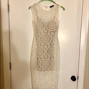 white lace dress with tan underneath